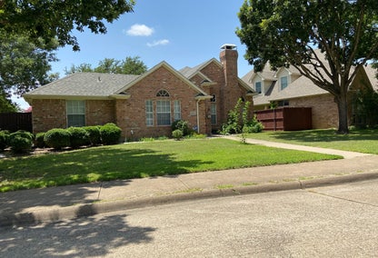 Exterior of brick home in Addison, TX
